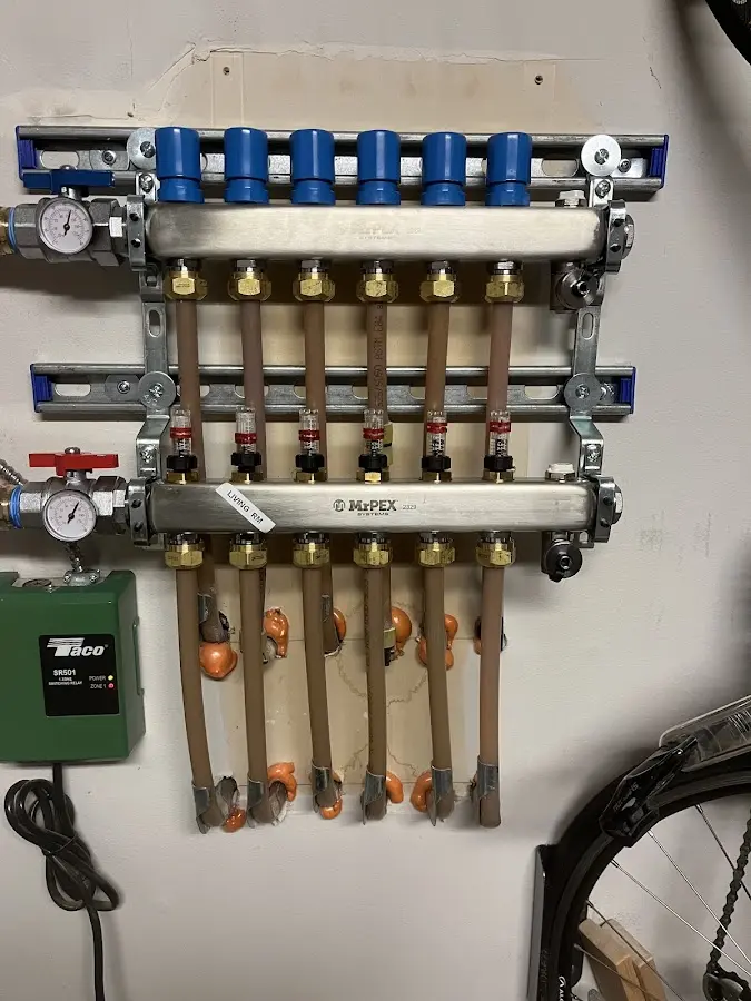 Plumber performing Water Heater Repair at a residential property in Pocono